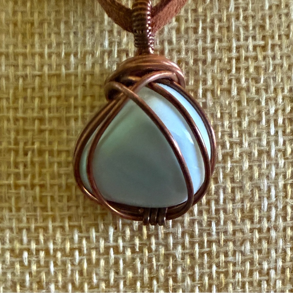 Copper pendant with Larimar stone on a leather cord